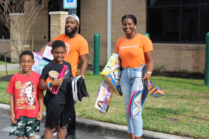 NextHome Executives Toys For Tot Toy Drive